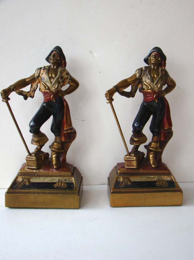 A pair of swashbuckler Pirate bookends made by Armor Bronze Company in 1926